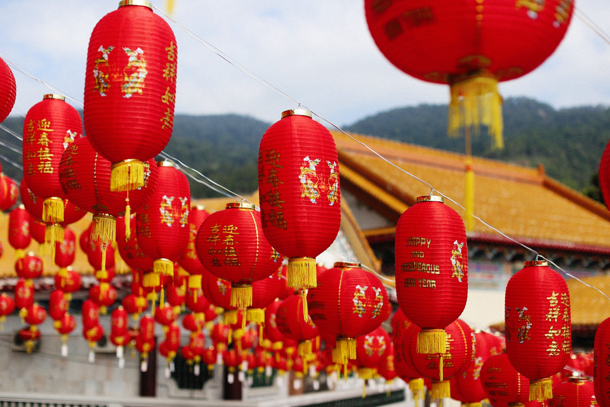 Close-up of vibrant red Chinese lanterns hanging outside during Lunar New Year