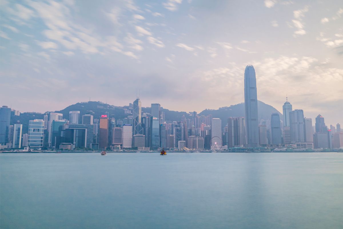 Hong Kong city skyline at dusk reflecting Cantonese urban style