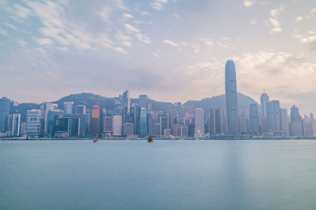 Hong Kong city skyline seen from Victoria Harbour — the setting that shaped Alan Tam's Cantopop empire