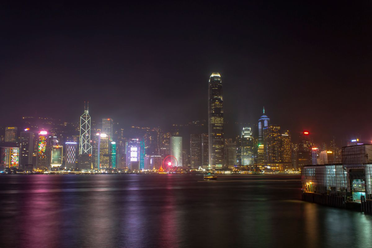 Illuminated skyline of Victoria Harbour, Hong Kong at night