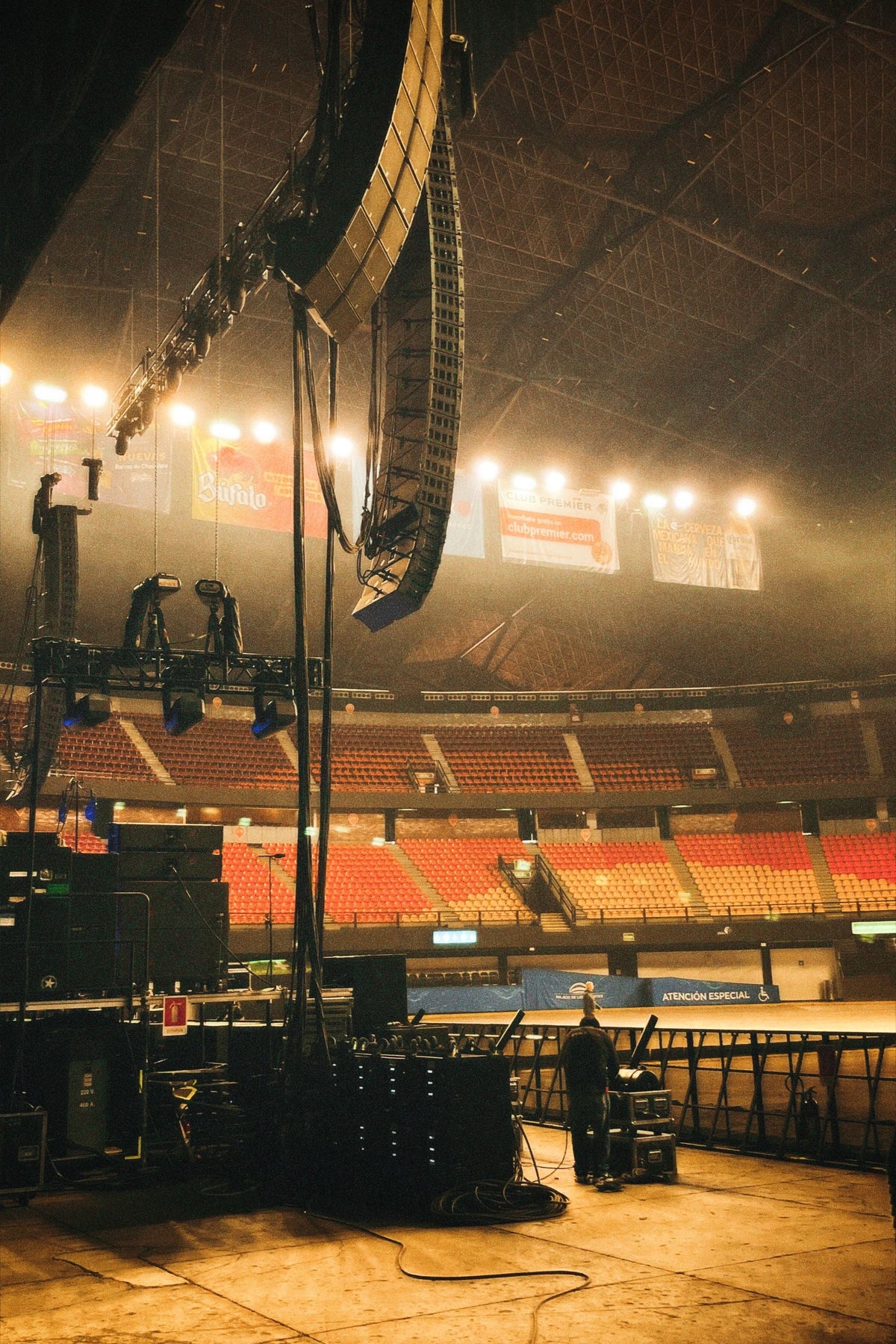 Empty concert stage in a stadium with stage lighting