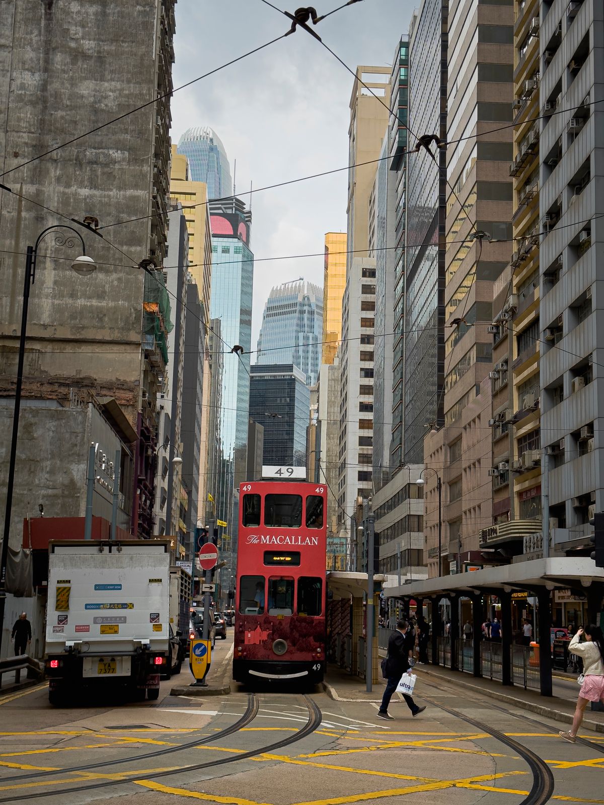 A Hong Kong double-decker tram passing through the city where cha chaan tengs still thrive