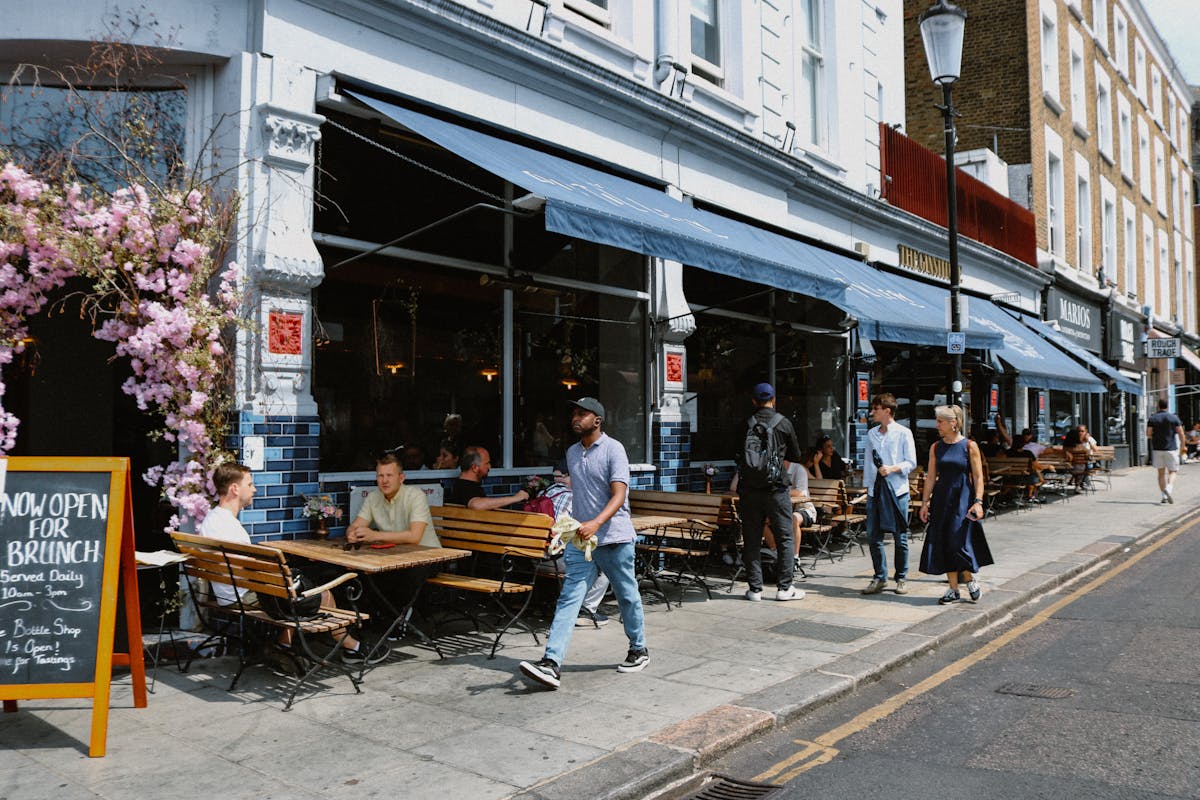 A street corner restaurant in London with outdoor dining
