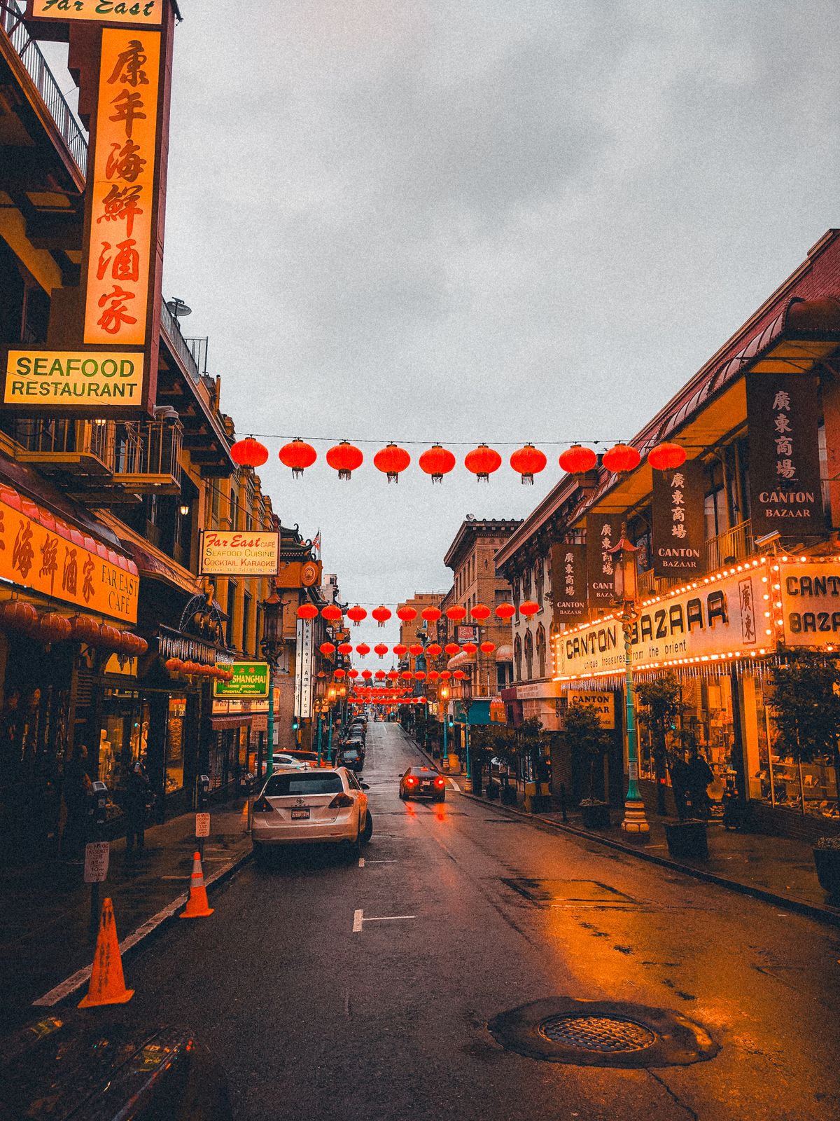Paper lanterns hanging over the street in San Francisco Chinatown at night