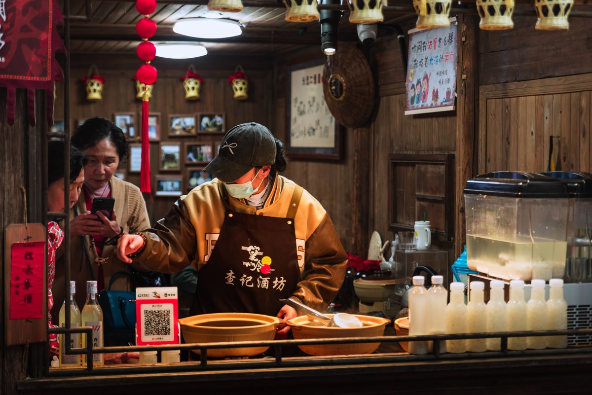 Chinese restaurant staff at work preparing food