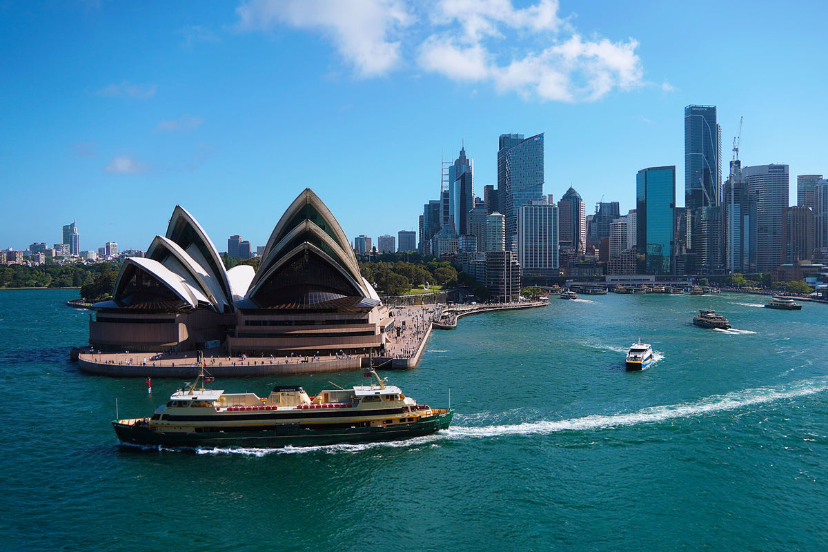 Sydney Opera House and harbour cityscape — the city Cantonese migrants have shaped for nearly two centuries