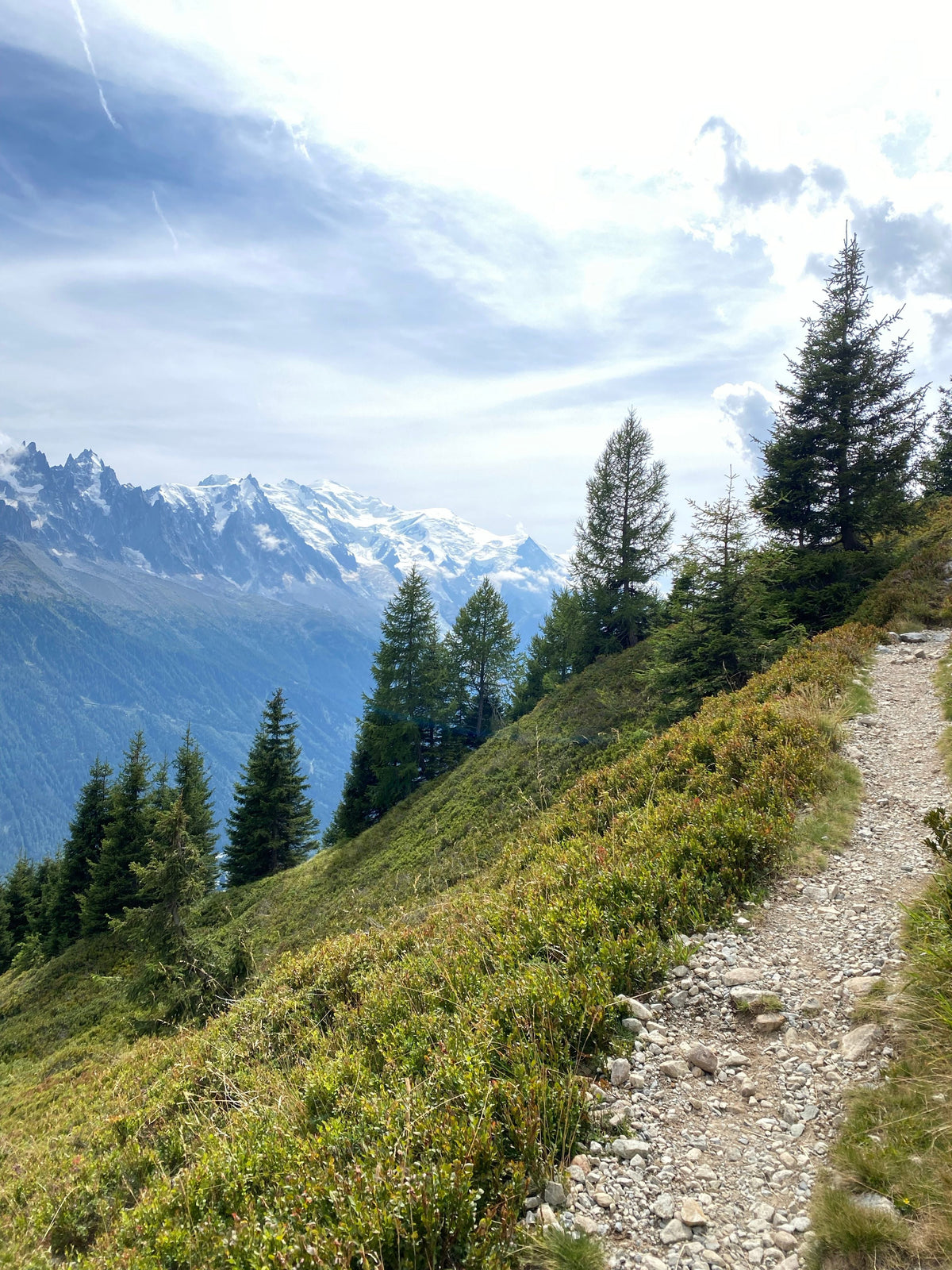 Scenic mountain trail along a dramatic alpine ridgeline landscape