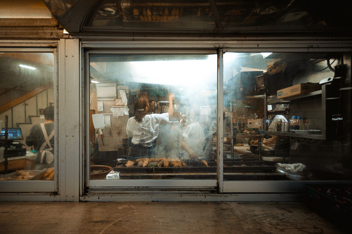 People cooking together in a home kitchen