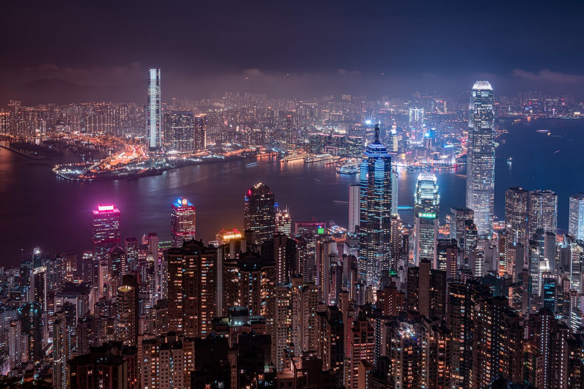 Hong Kong city skyline glittering at night over the harbour